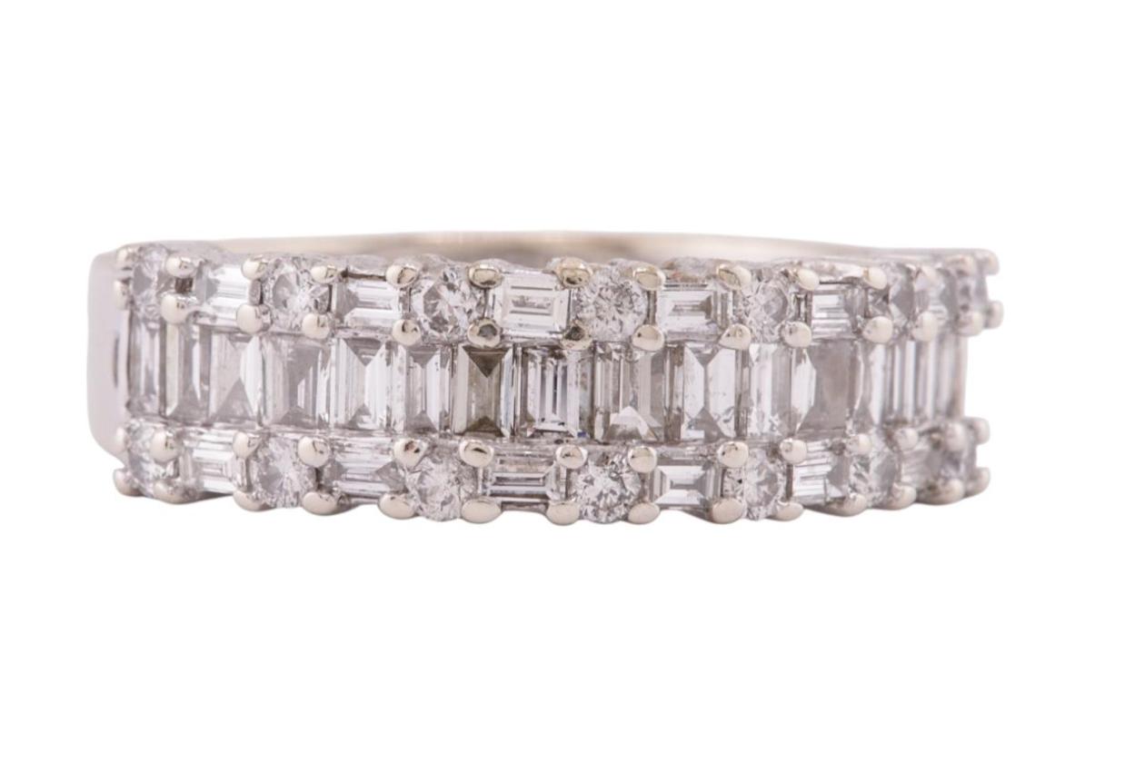 A DIAMOND-SET HALF ETERNITY RING