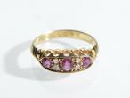 Edwardian ruby and diamond three stone band in gold