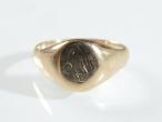 9kt yellow gold oval signet ring with faint initials