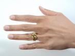 Contemporary cognac diamond double snake ring in yellow gold