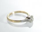 Antique cushion shape diamond solitaire in 18kt gold