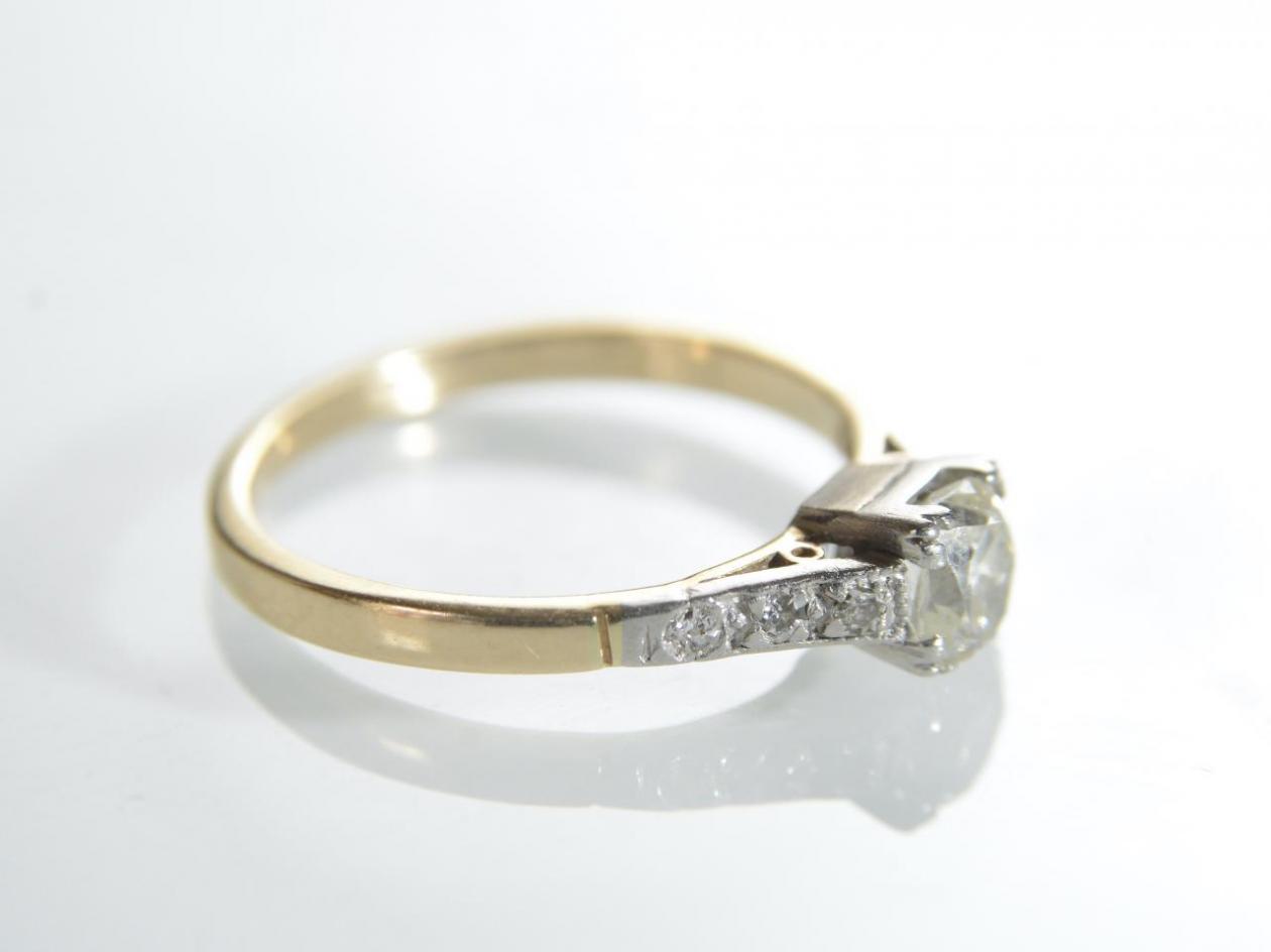 Antique cushion shape diamond solitaire in 18kt gold
