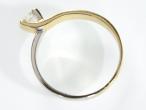 Contemporary two tone 18kt gold diamond solitaire twist ring