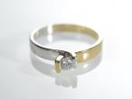 Contemporary two tone 18kt gold diamond solitaire twist ring