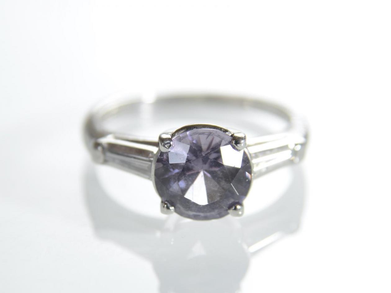 Vintage natural purple spinel and diamond solitaire ring