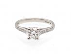 1.01ct diamond solitaire with diamond set shoulders in platinum