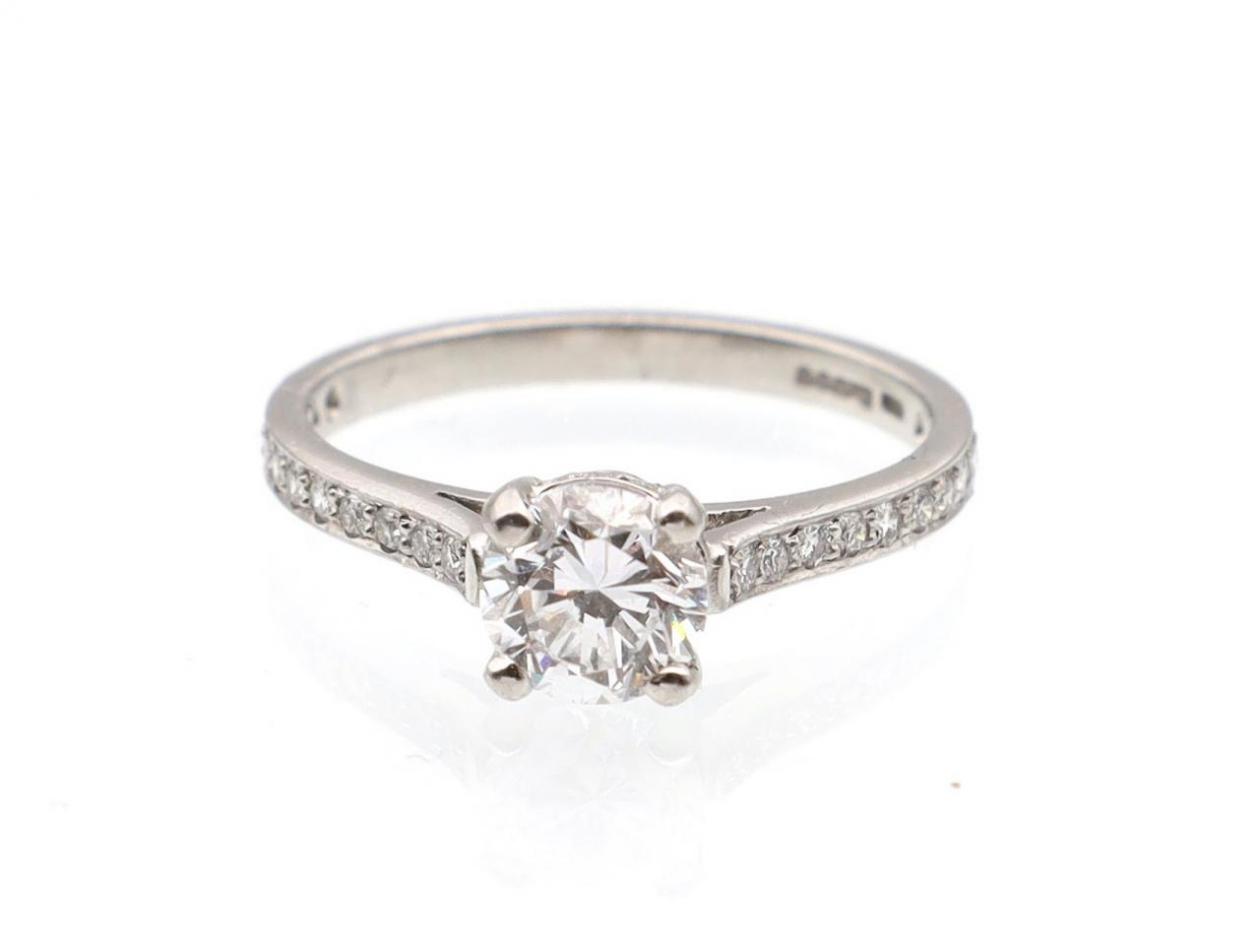 1.01ct diamond solitaire with diamond set shoulders in platinum