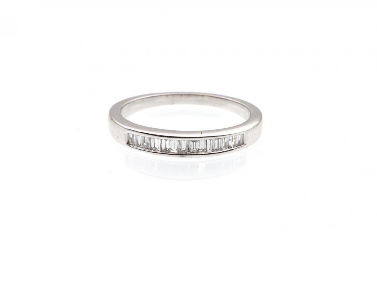 18kt white gold half eternity set with baguette cut diamonds