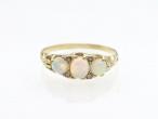 Victorian three stone opal and diamond carved ring in gold