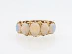 Antique opal five stone ring in 18kt yellow gold