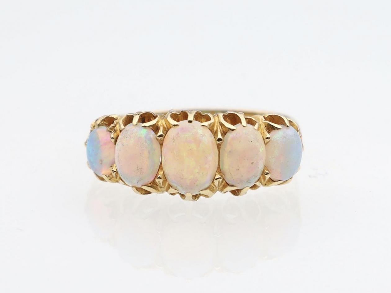 Antique opal five stone ring in 18kt yellow gold