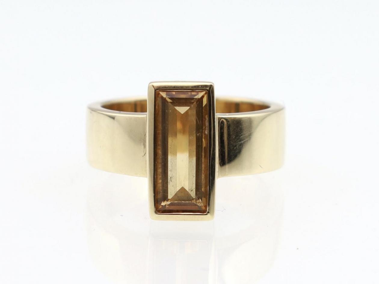 Modernist rectangular step cut citrine dress ring in gold