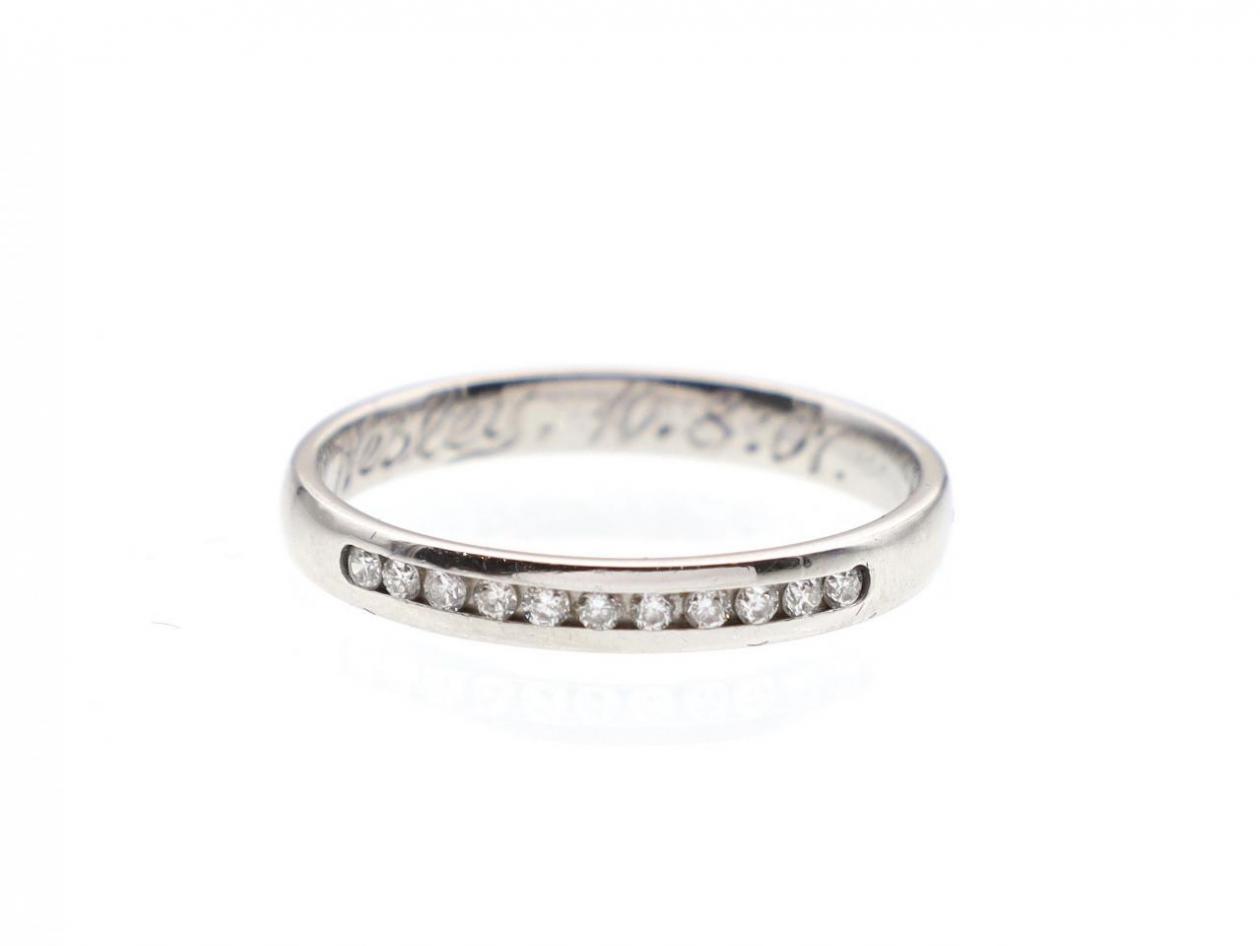 Platinum diamond channel set half eternity ring