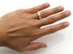 Princess cut diamond band ring with frosted channel settings