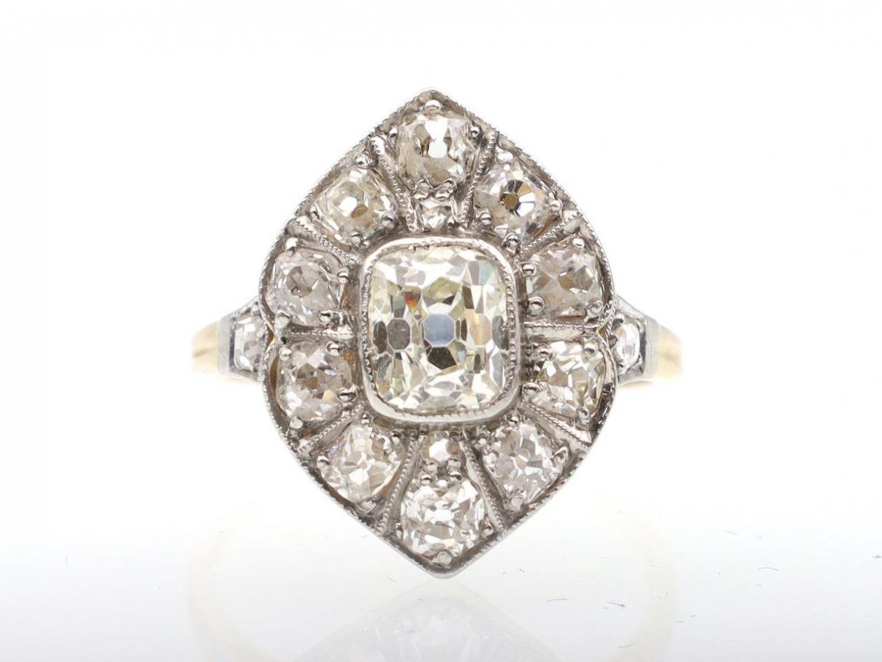 Antique curved navette diamond cluster ring in platinum and gold
