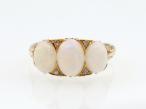 Antique white precious opal three stone carved ring in gold