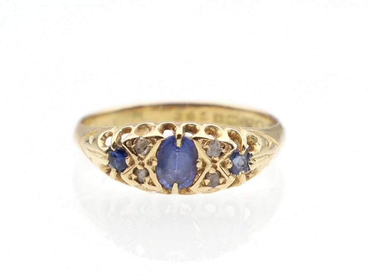 1918 sapphire and diamond carved ring in 18kt yellow gold