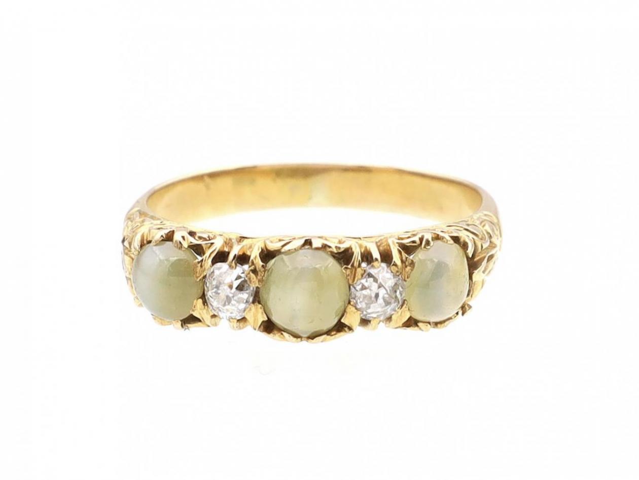 Antique cat's eye chrysoberyl and diamond carved ring in gold