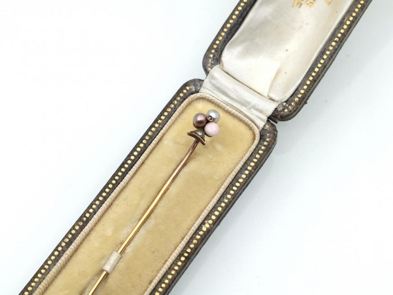 Antique diamond pearl and coral trefoil stick pin in silver and gold