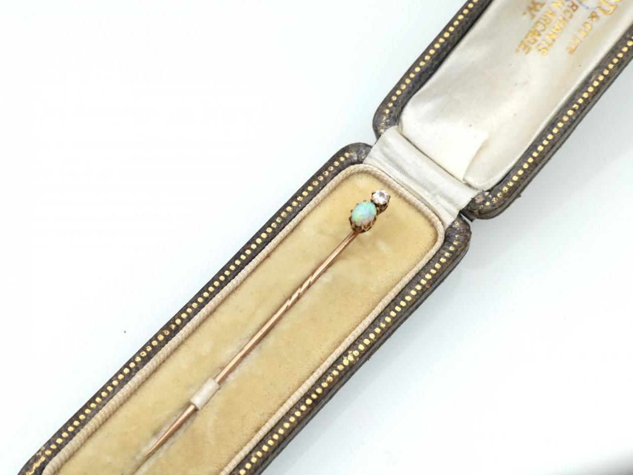 Antique diamond and opal stick pin in gold