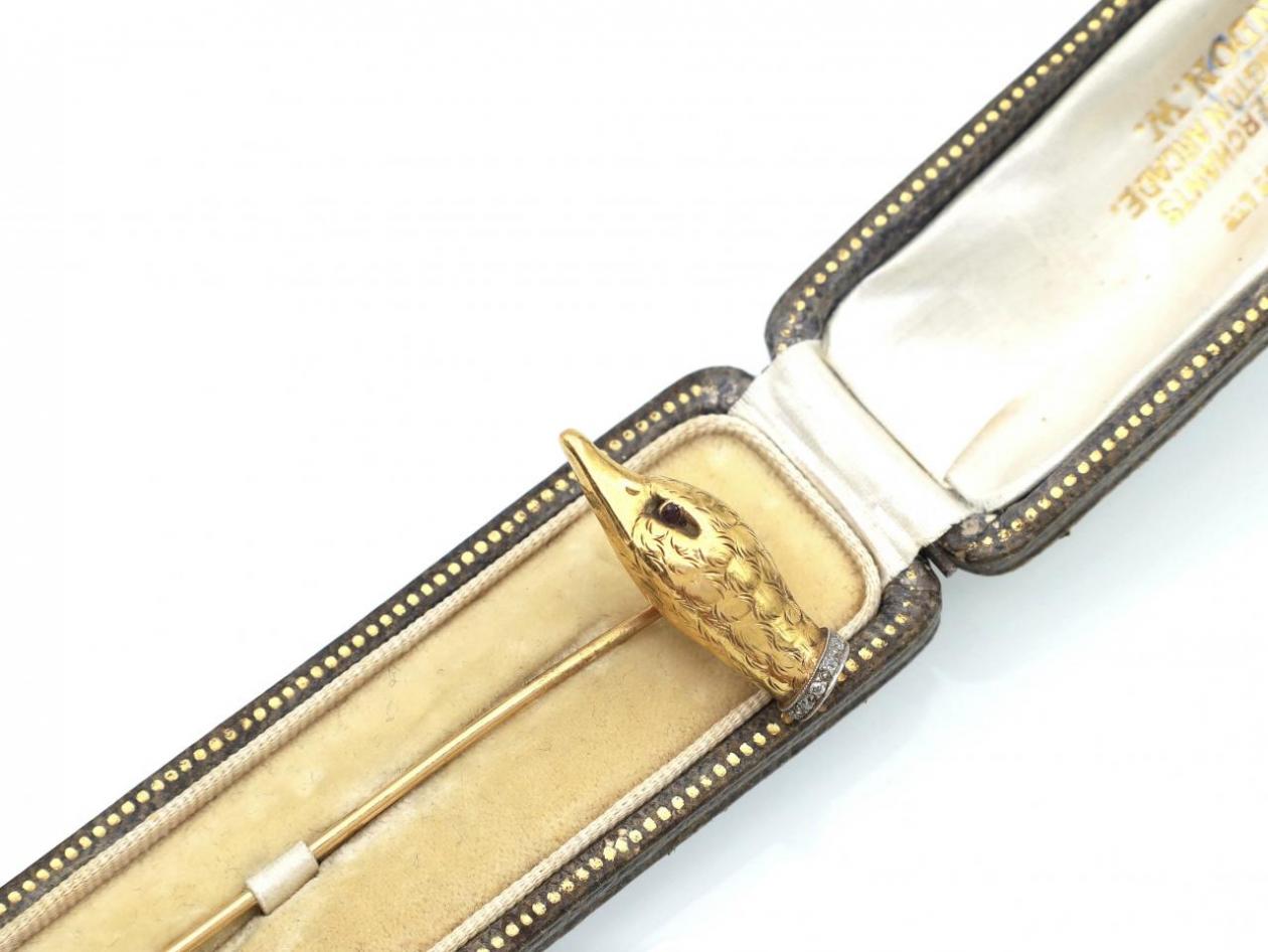 Edwardian duck head stickpin set with diamonds in gold