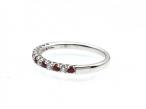 Ruby and diamond claw set half eternity in 18kt white gold