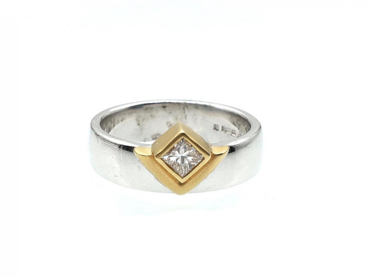 Modern 18kt white and yellow gold diamond solitaire ring