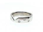 18kt white gold diamond set fitted band with angular cut out