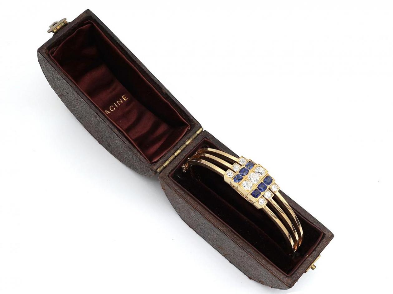 Art Deco diamond and sapphire hinged bangle in yellow gold