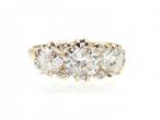 Antique three stone diamond ring in 18kt yellow gold