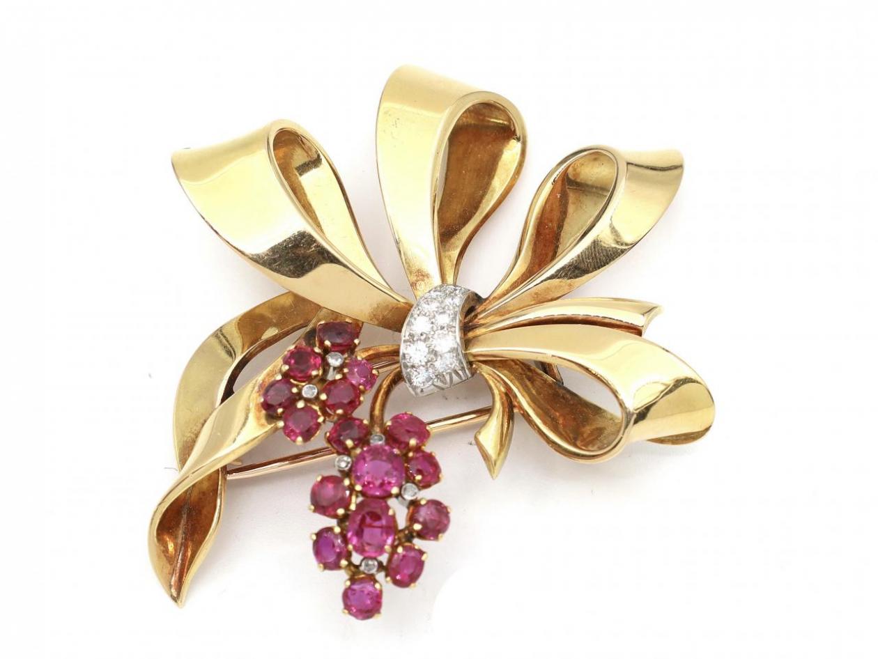 1950s diamond and ruby bow brooch in 18kt yellow gold
