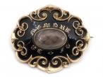 Antique memorial brooch with hair art and black enamel in yellow gold