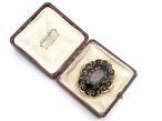 Antique memorial brooch with hair art and black enamel in yellow gold