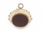 Antique carnelian bloodstone spinning fob pendant in yellow gold