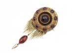 Victorian garnet carbuncle tassel brooch with hidden locket