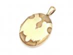 Victorian 15kt yellow gold oval locket with polished banner