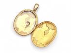 Victorian 15kt yellow gold oval locket with polished banner