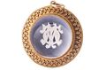 VICTORIAN ESSEX ROCK CRYSTAL GOLD PENDANT ENCLOSING INITIALS T.O.M, CIRCA 1870