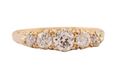 A five stone diamond ring in 18kt yellow gold