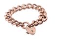 Vintage curb link rose gold bracelet with heart shape locket
