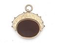 Antique carnelian bloodstone spinning fob pendant in yellow gold