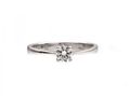 Four claw round brilliant cut diamond solitaire ring