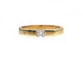 Diamond solitaire engagement ring in 18kt yellow gold