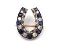 Antique French sapphire and diamond horseshoe brooch