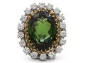 Retro green tourmaline and diamond oval cluster ring in gold and platinum