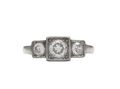 Art Deco three stone diamond ring in square platinum settings