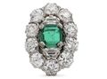 Impressive retro emerald and diamond cluster ring in platinum