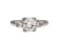 Vintage flanked diamond solitaire engagement ring in platinum