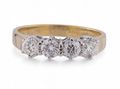 Vintage four stone diamond ring in 18kt yellow gold