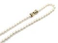 Vintage cultured pearl necklace with a yellow gold bow clasp